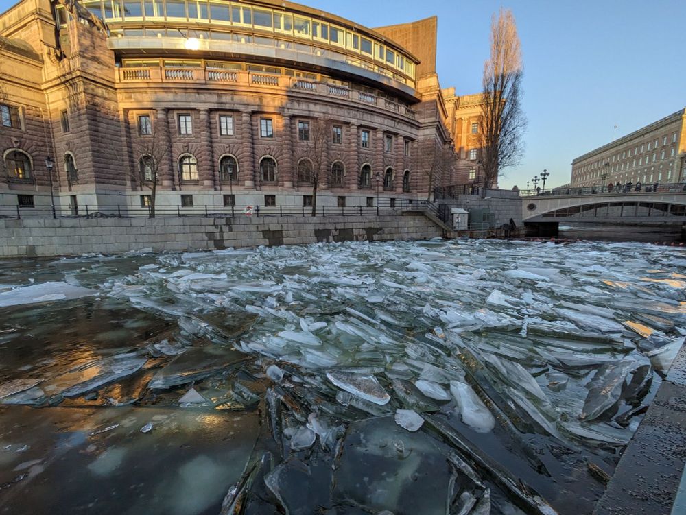 Lake ice piled up in the channel beside the Swedish parliament building