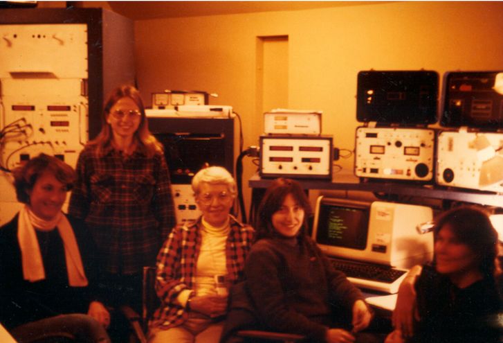 Vera Rubin and fellow women astronomers in the console room of the 2.5-meter du Pont telescope at Carnegie Science’s Las Campanas Observatory in October 1985. Rubin broke barriers for women in astronomy and was an advocate for women in STEM throughout her career. Pictured are Renee Kraan-Korteweg (University of Basel), Deidre Hunter (Carnegie Science), Vera Rubin (Carnegie Science), Wendy Freedman (Carnegie Science), and Anja Schroeder (University of Basel). At the time, Freedman was conducting observations on the 2.5-meter telescope, Kraan-Korteweg and Schroeder were working with the 1-meter Swope Telescope, while Hunter and Rubin were scheduled to begin their observations on the 2.5-meter the following night. Credit: Carnegie Science