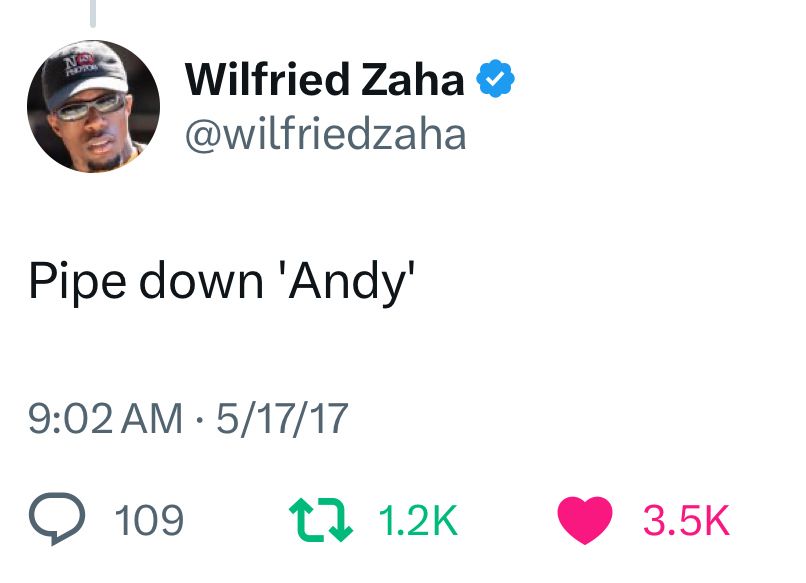 A tweet reply from Wilfried Zaha reading “Pipe down ‘Andy’”