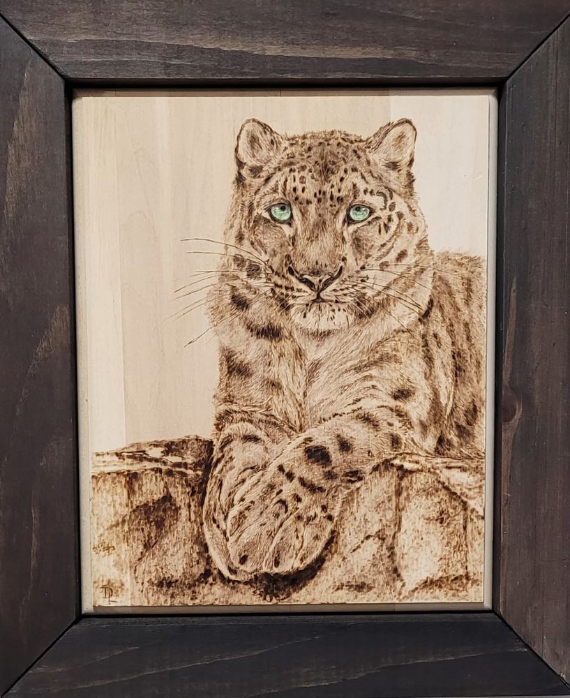 Snow Leopard Artwork entitled "Resting" by Debi Lockhurst
