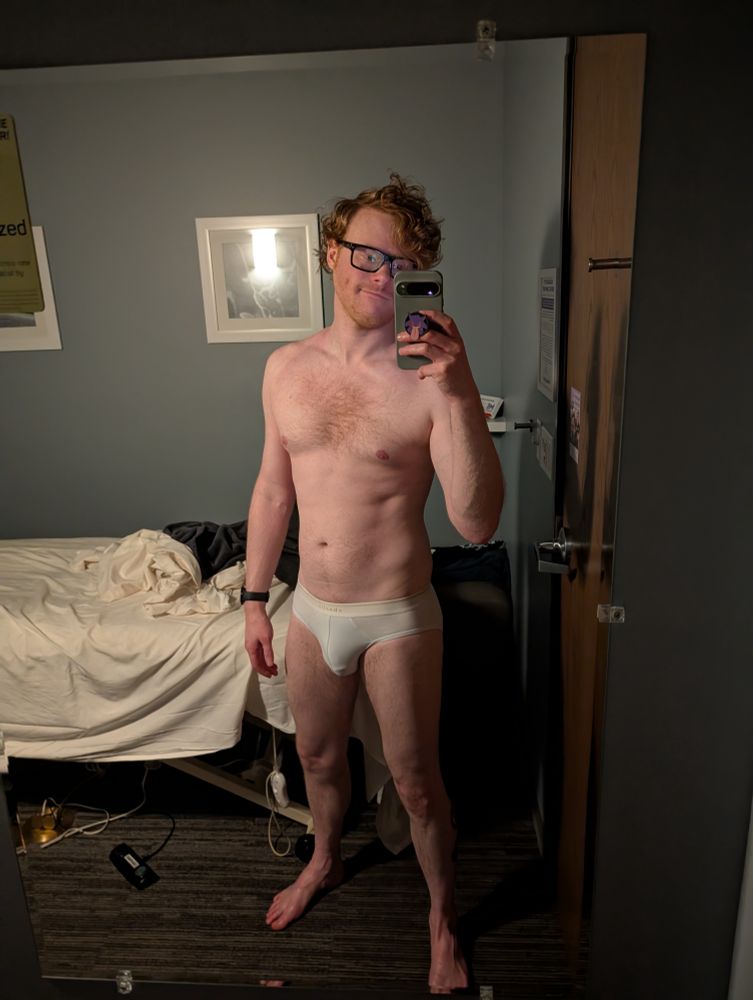 Picture of me in a massage parlor room wearing only some white briefs