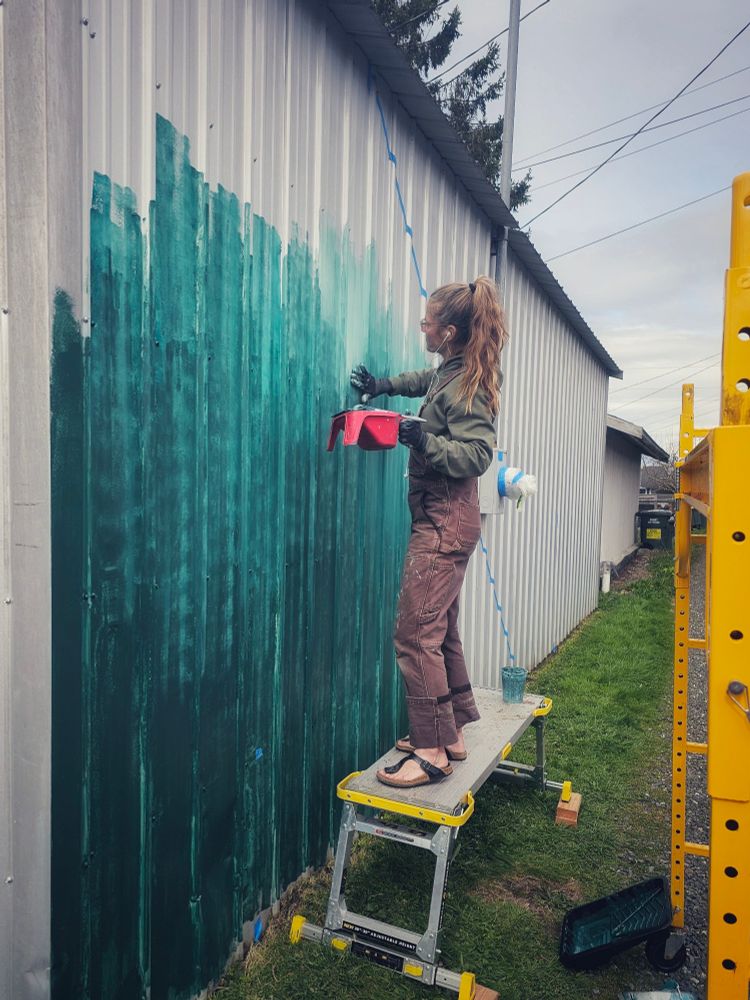 Artist Darcie Gray is painting a mural in Bellingham, Wa.