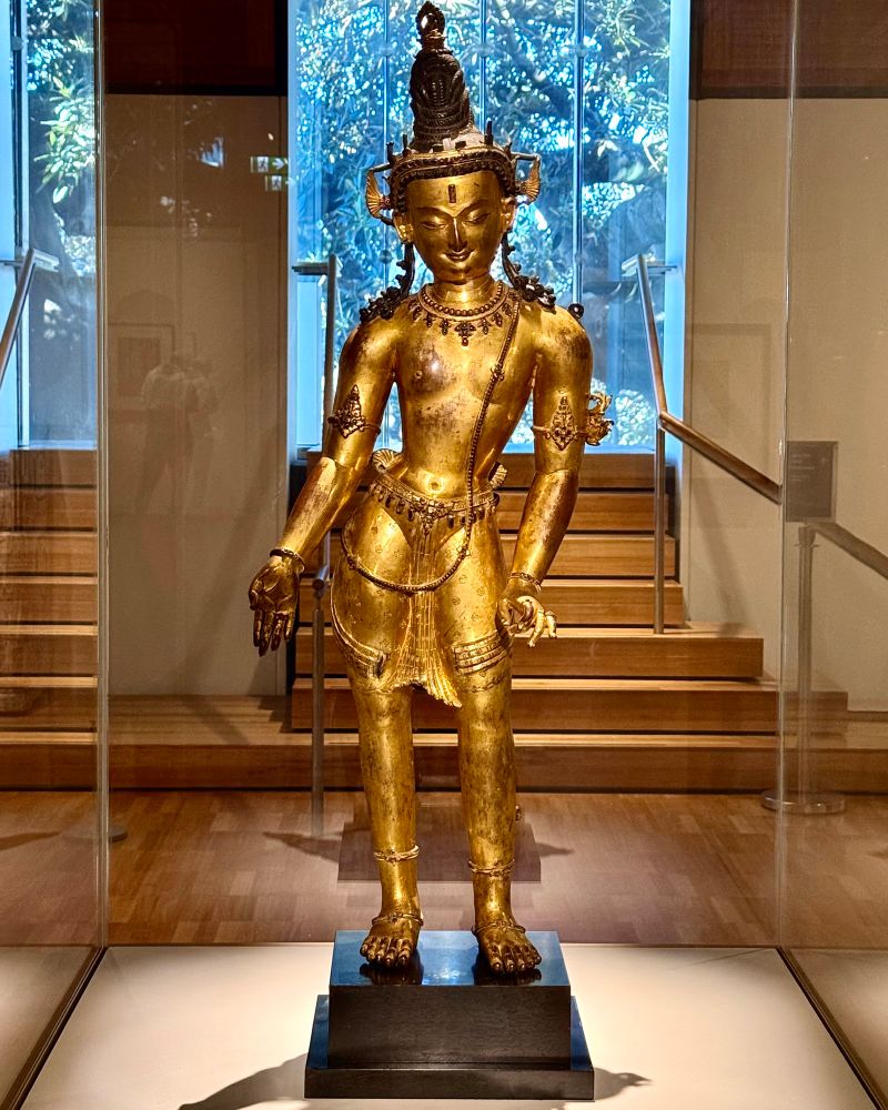 a statue of a gilt Bodhisattva, about 800 years old