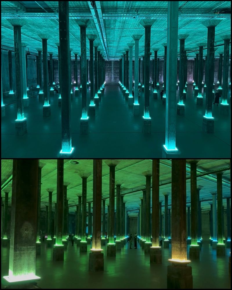 a photo of a vast subterranean tank full of thin columns, lit up mysteriously - green light