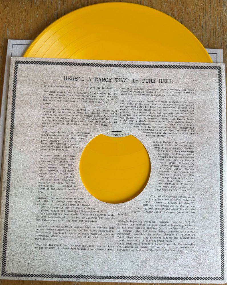 Inside sleeve of vinyl "Seminal Live" by The Fall, showing yellow vinyl 