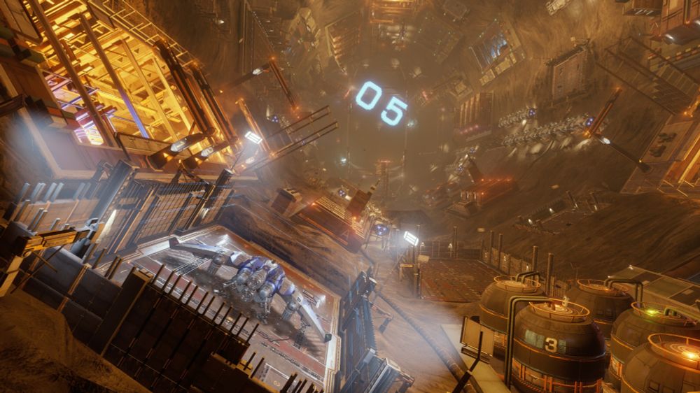 A Mandalay spacecraft docked on landing pad 5 inside an asteroid station.