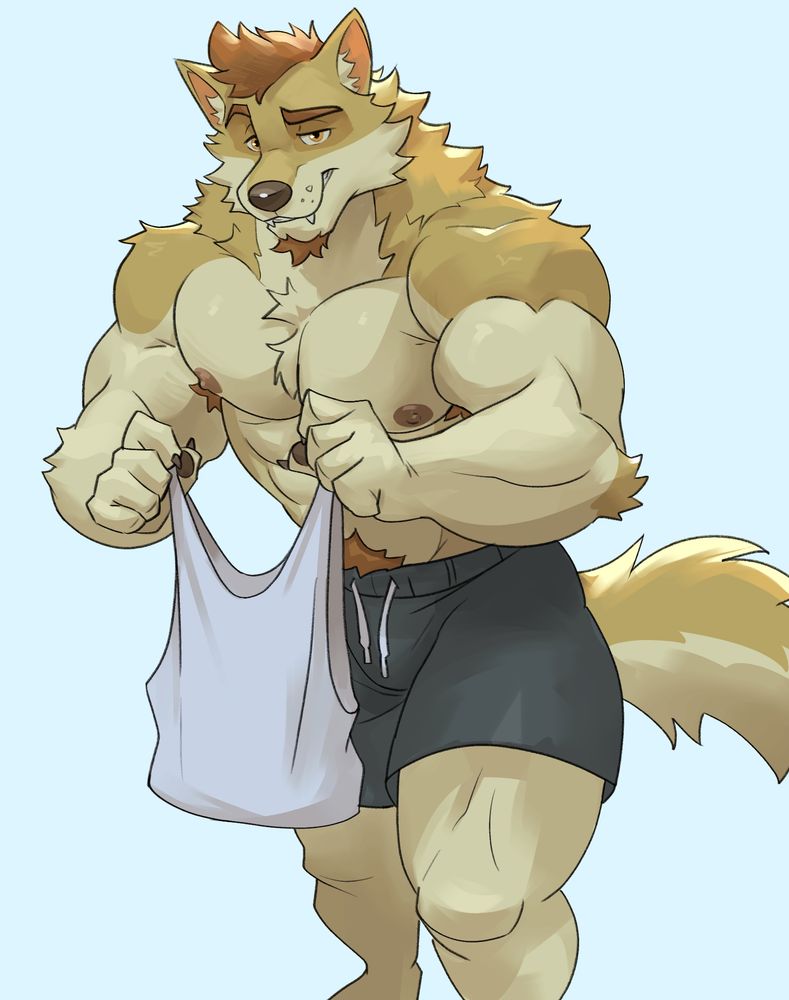 Alejandro holding a rather small tanktop