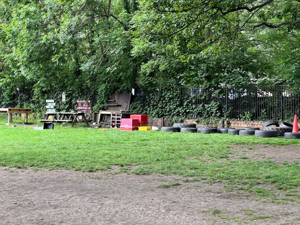 Lots of loose parts, benches and other play things. 