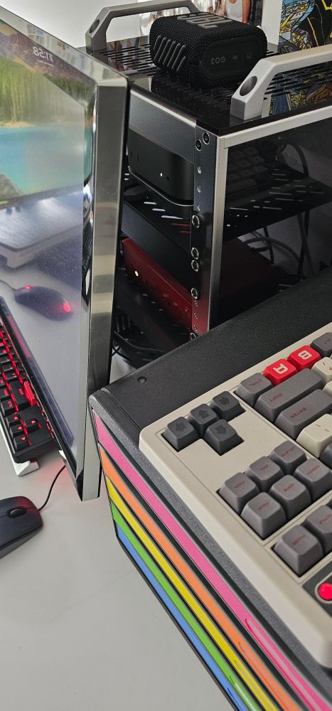 Photo of the DeskPi fully installed and plugged