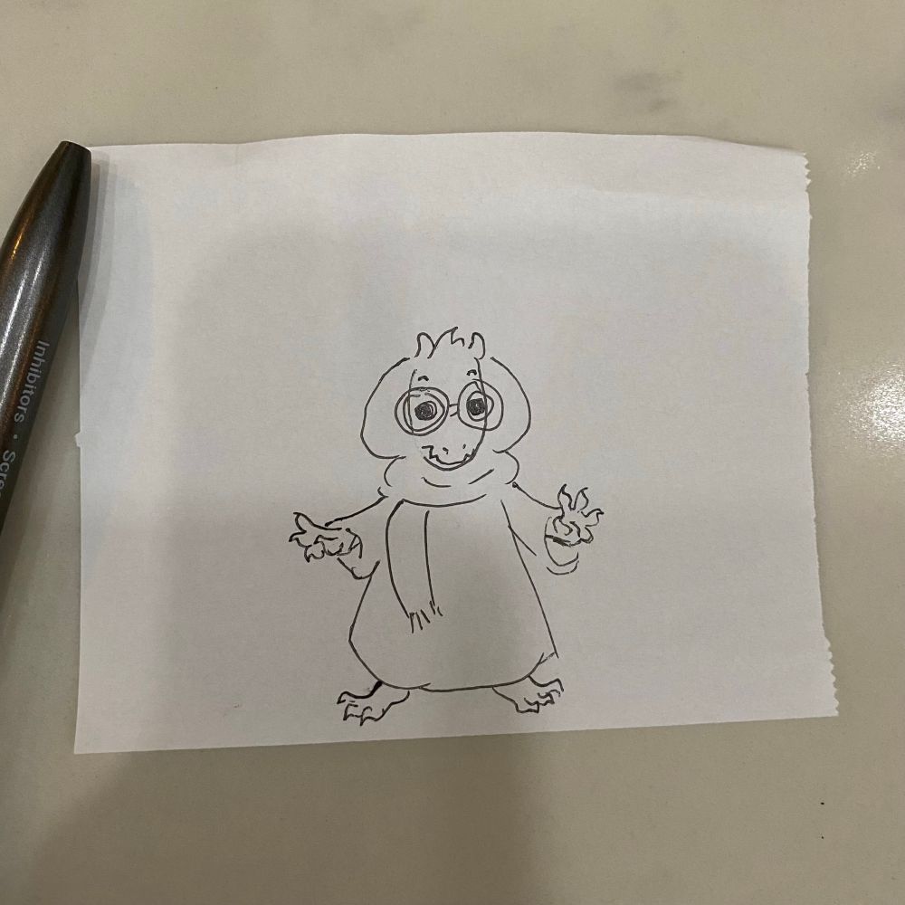 The goat-like character Ralsei from hit indie series Deltarune, poorly drawn on receipt paper