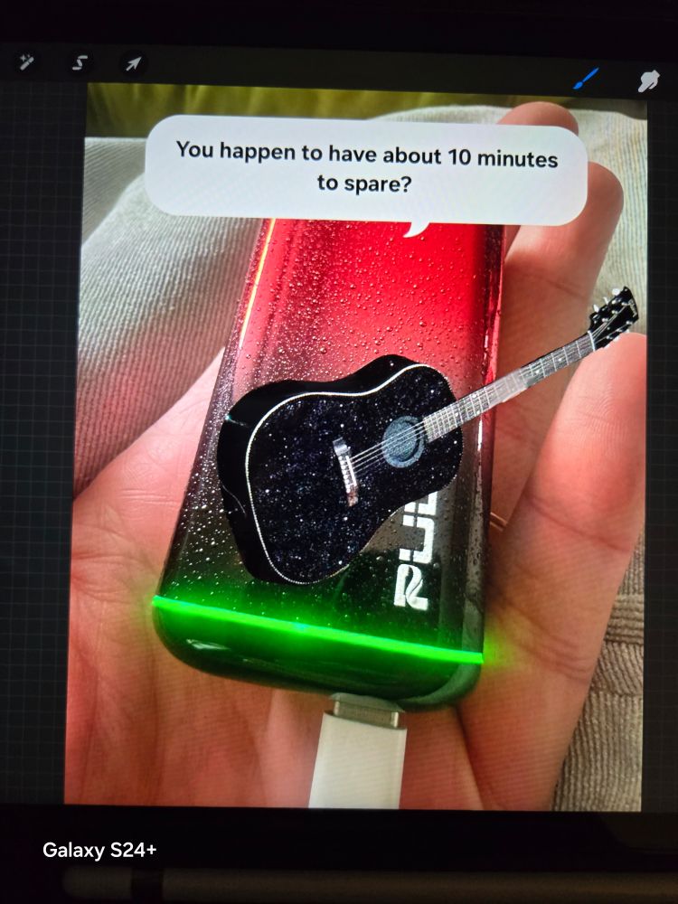 Red/black ombre vape in a hand, with a black guitar edited over it asking if you have 10 minutes to spare. 
