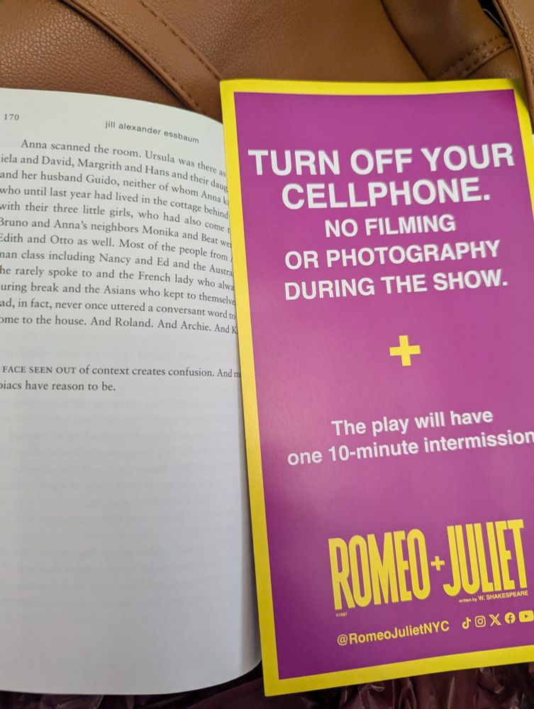 Open book with playbill insert as bookmark