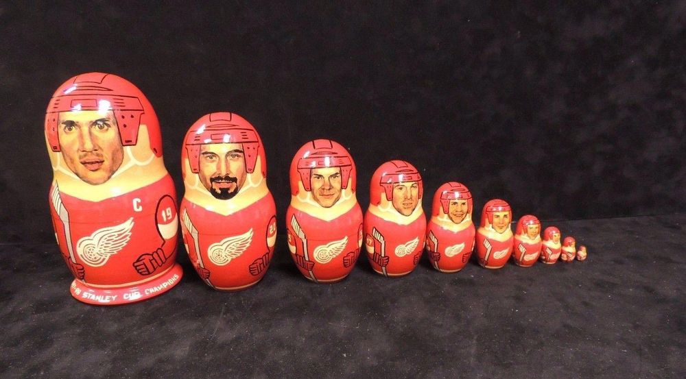 10 Detroit Red Wings matryoshka dolls, arranged from large to small.