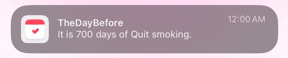 a screenshot of a notification from TheDayBefore that reads “It is 700 days of Quit smoking”