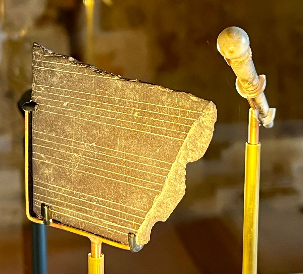 Medieval slate scored for music