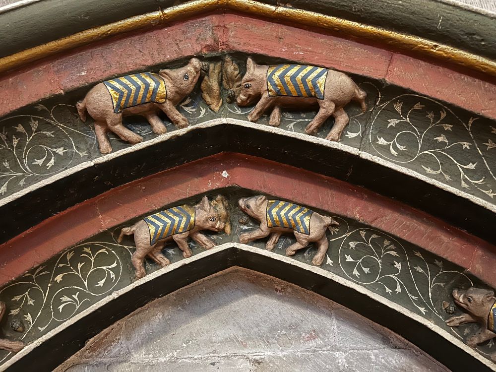 Close up of medieval tomb’s pigs