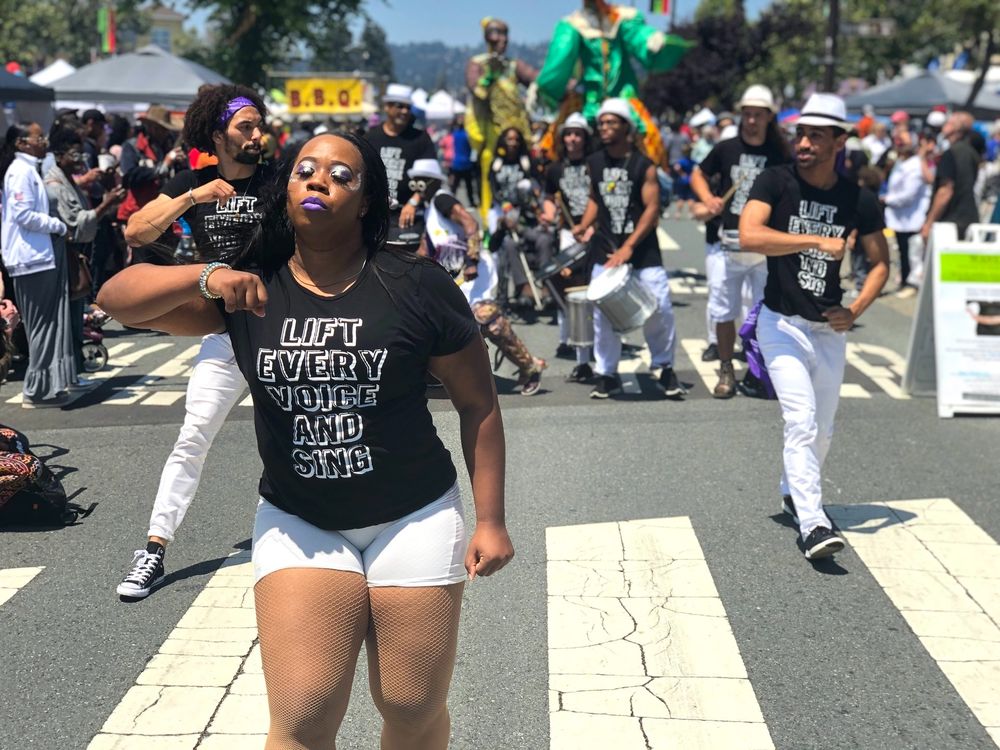 Photo: Members of the SambaFunk! collective dance and drum during the 2019 Berkeley Juneteenth Festival (Liliana Michelena/KQED). Catch them performing at noon this Sunday!