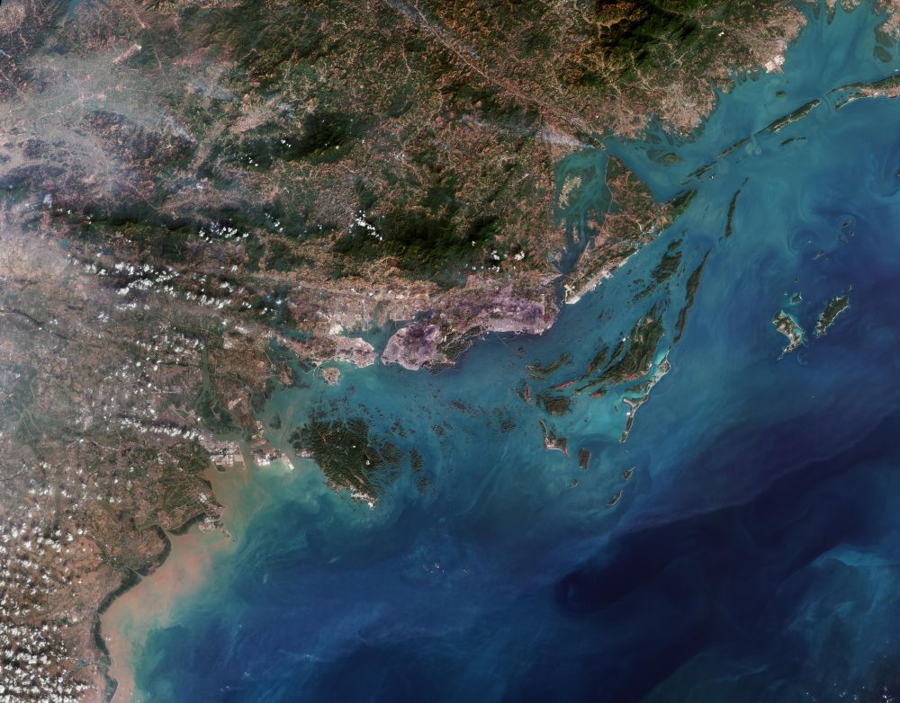 This satellite image showcases striking rocky formations amid the blue waters of Halong Bay in northeast Vietnam.