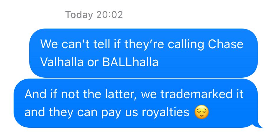 Two text messages reading: “We can’t tell if they’re calling Chase Valhalla or BALLhalla” and “And if not the latter, we trademarked it and they can pay us royalties” with a smug emoji