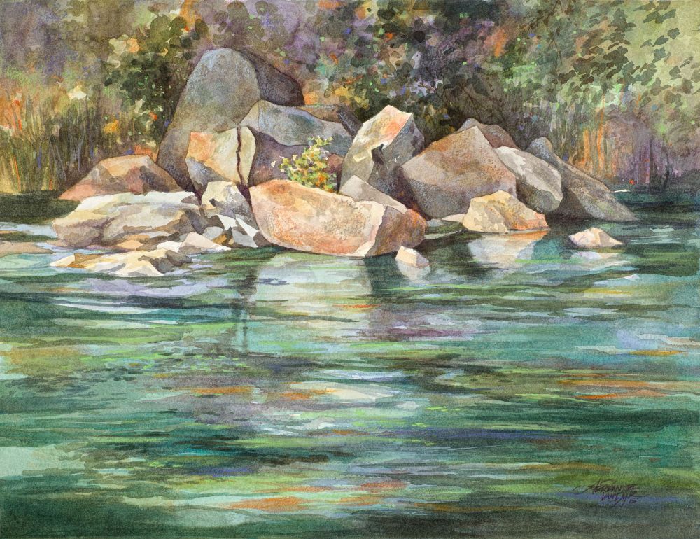 River rocks with water reflections all green water