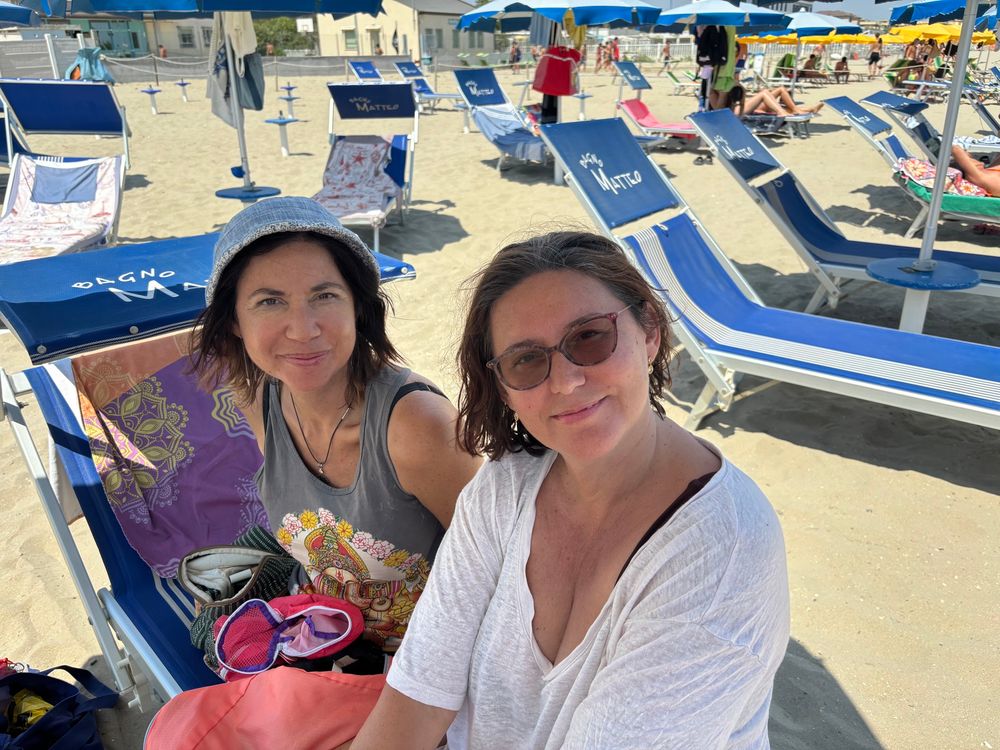 With sister on the beach