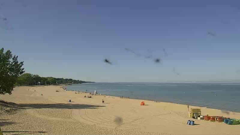 View looking south over Silver Lake Beach as it meets Lake Michigan. // Image captured at: 2025-09-01 14:06:11 UTC (about 1 min. prior to this post) // Current Temp in St Joseph: 67.11 F | 19.51 C // Precip: clear sky // Wind: ESE at 6.107 mph | 9.82 kph // Humidity: 70%