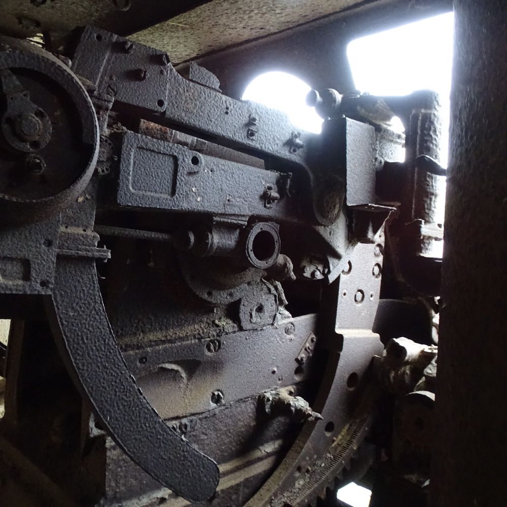 A close up view of some of the gun mechanisms inside the casemate