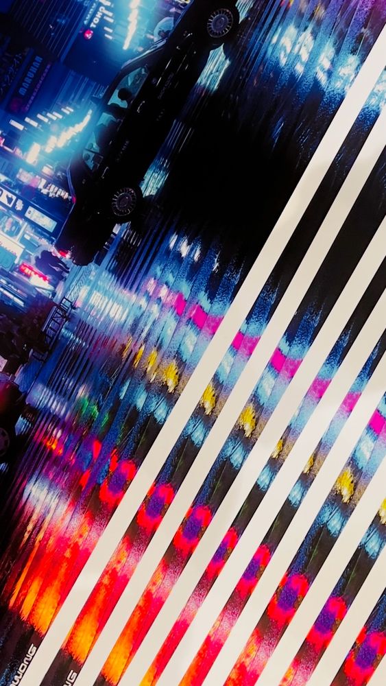 Photograph of many signed color prints. 