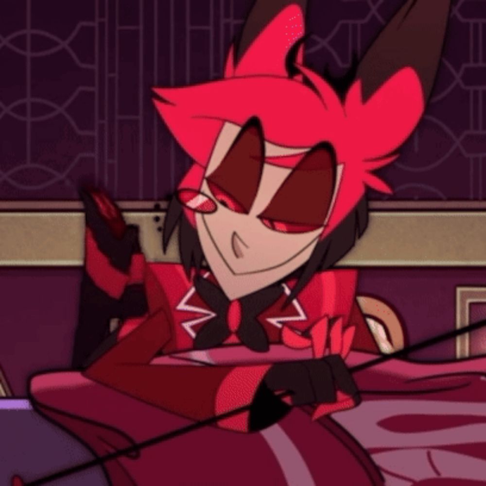 a cartoon character with red hair is sitting on a bed holding a sword .