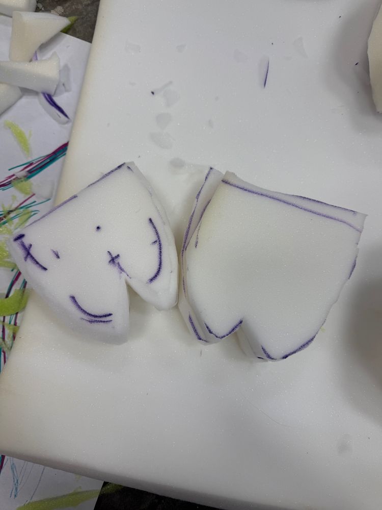 Foam hooves
The left one is basically done being shaped and the other is practically just started only being glued together at the moment