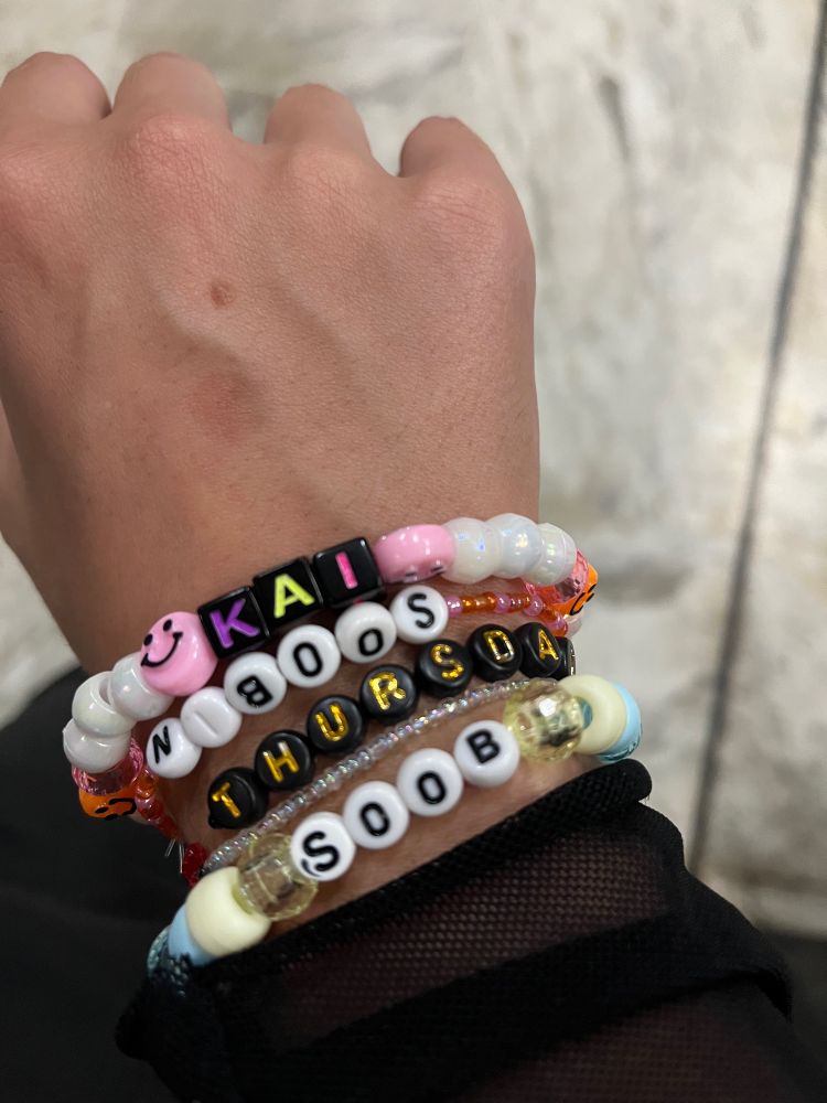 Friendship bracelets that say Kai, Soobin, Thursday, and soob