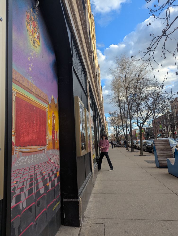 Street shot of a painting at The Music Box Theater