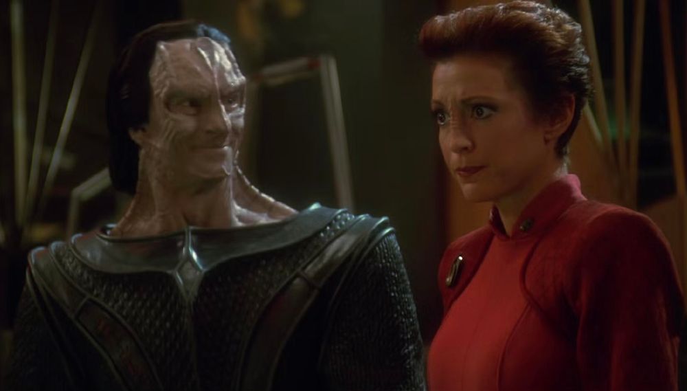 Gul Dukat looking at Major Kira Nerys, from Star Trek Deep Space Nine
