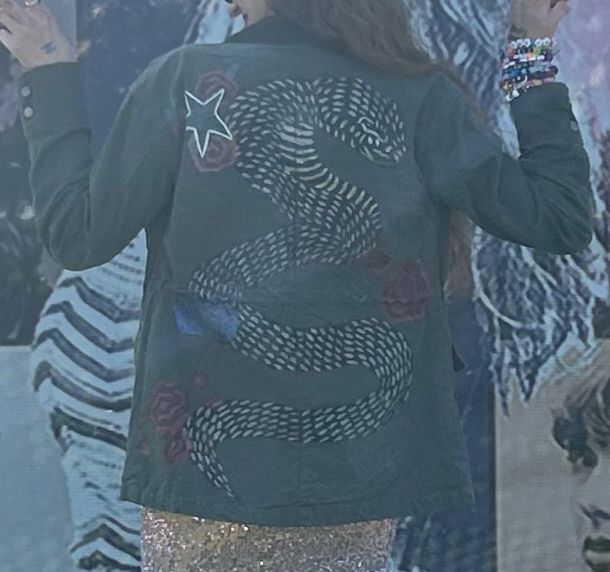 jacket painted to look like taylor swift’s on the reputation tour
