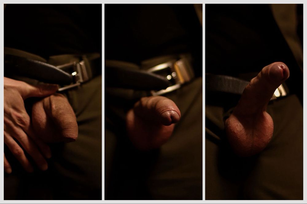 a close of up of a man wearing a suit with his cock in vary states of erection 