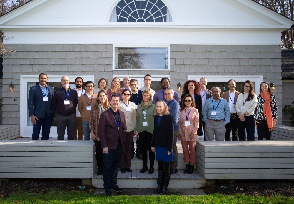Group of 23 participants on the patio outside the conference center