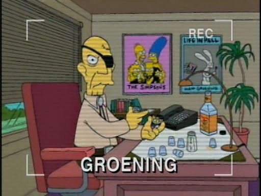 file footage of Simpsons creator "Matt Groening," looking a bit like latter day John Ford, caught right before having his 7th shot of tequila for the morning.