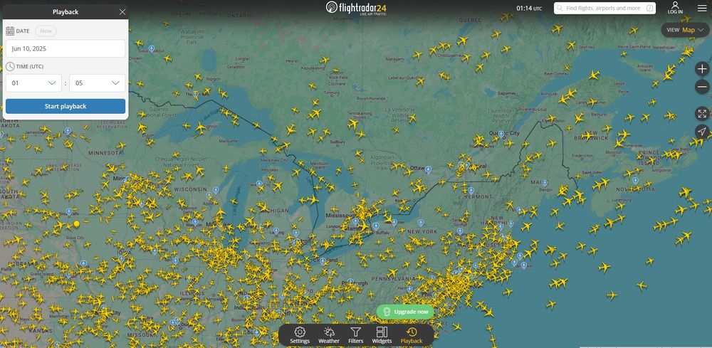 FlightRadar24 map showing flight activity over eastern Canada and northeastern US as of 9:15PM EST on 6/9/25, and displaying the playback option allowing selection of date and time to show activity.
