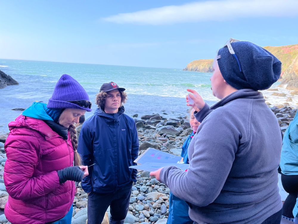 Chloe - the island geographer - working on fieldwork ideas with our group.