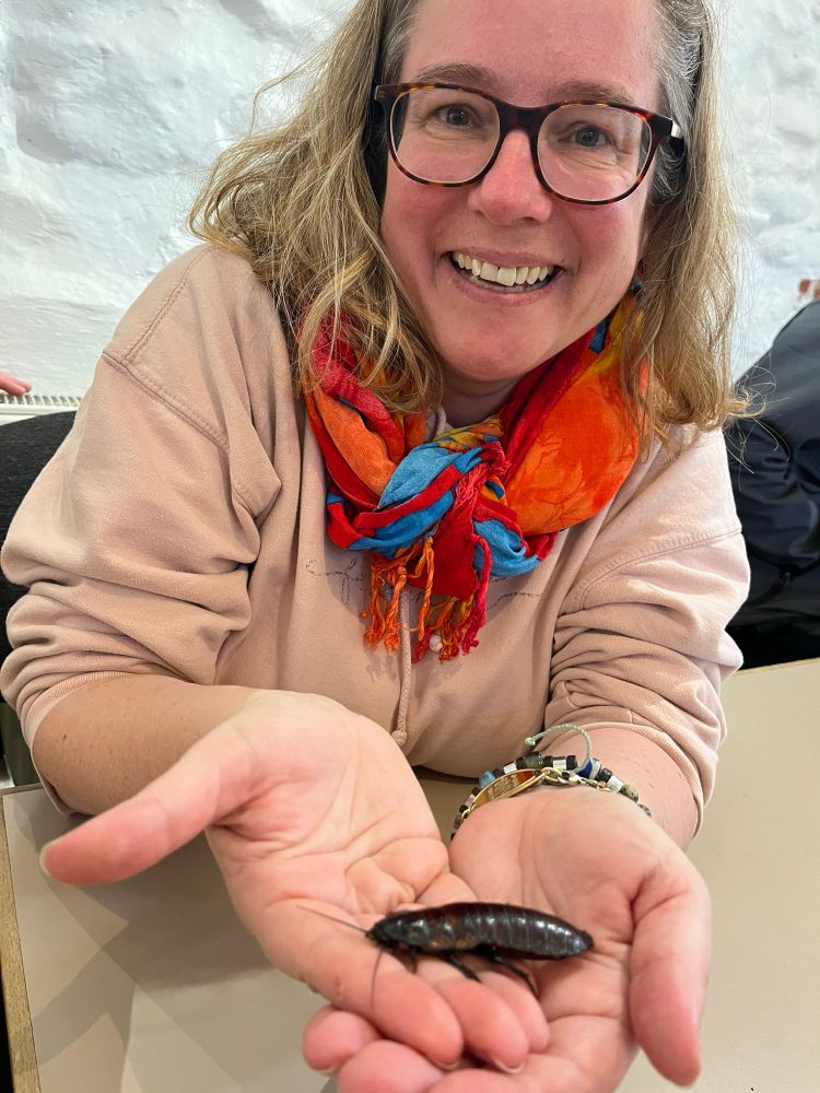 Catherine holding a hissing cockroach! 