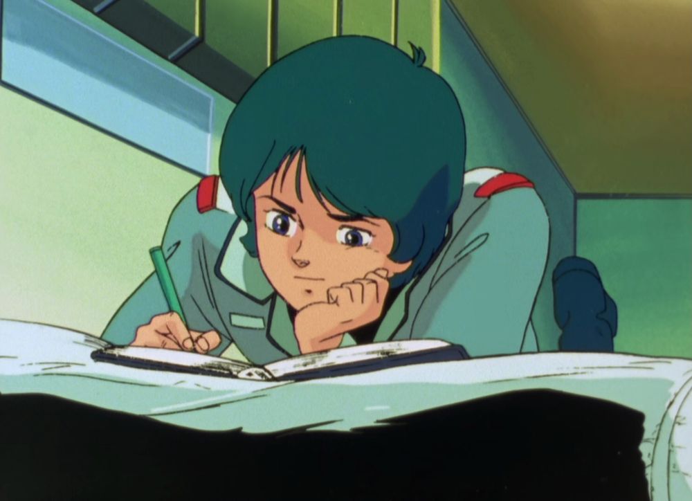 Kamille writing in his journal
