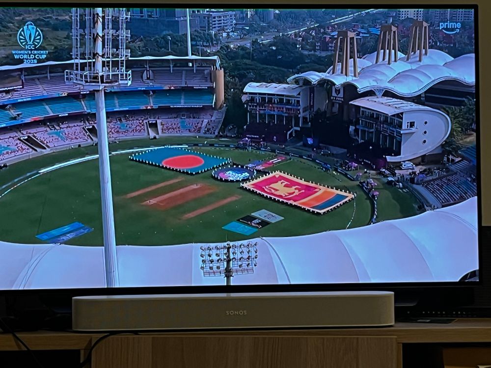The flags of Bangladesh and Sri Lanka, stretched out by little kids on a sunny hot cricket ground in Mumbai. 
