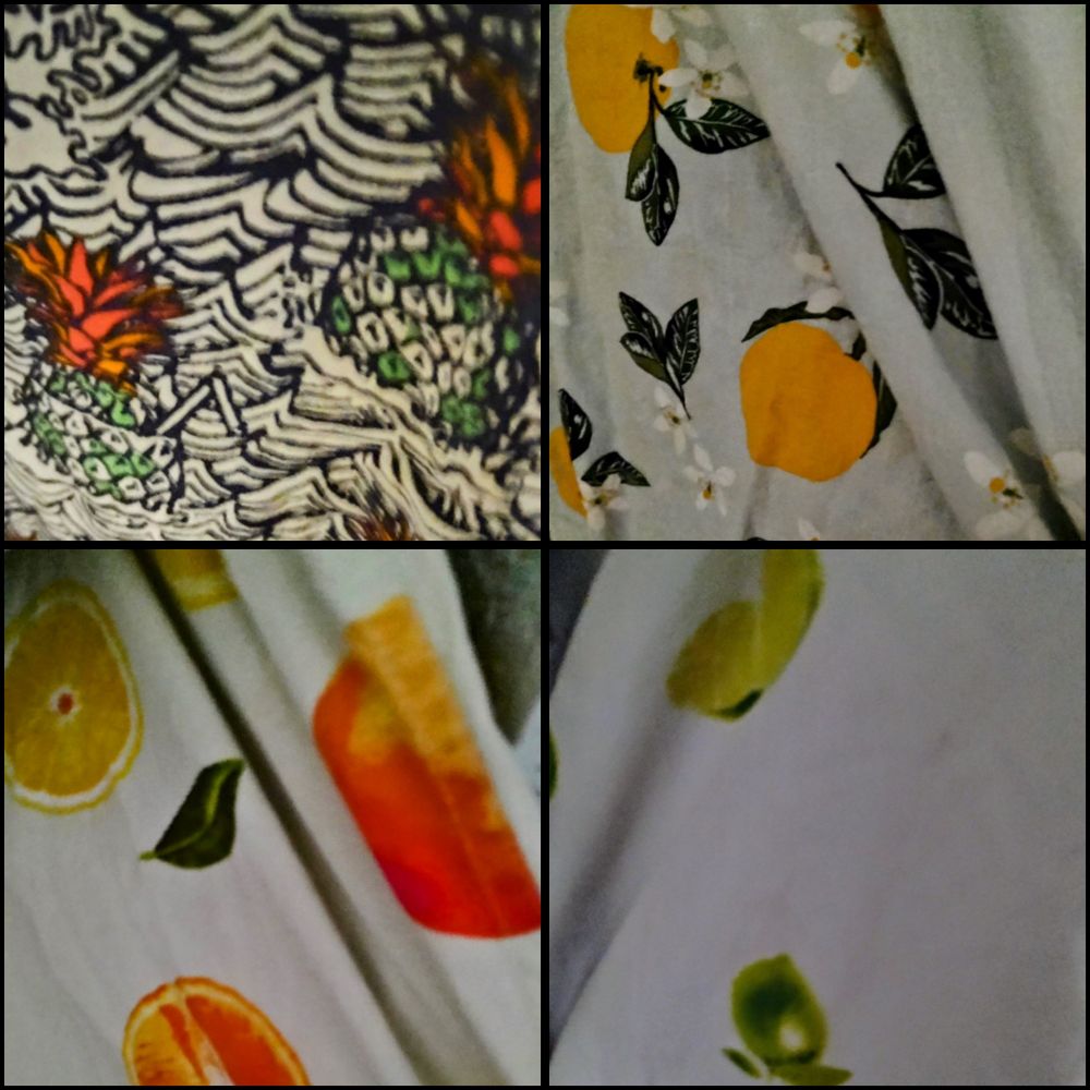 A grid of four different close ups of clothing patterns, all featuring citrus or tropical fruits. The upper left one has a black and white ocean wave pattern, with black and white and green and orange pineapples scattered throughout. The upper right one has lemons on lemon tree branches against a pale blue background, with white flowers in bloom on the branches. The bottom left pattern features lemons and oranges both whole and sliced with some of the leaves to those plants as well, against an off white background. The bottom right pattern features whole limes with their leaves attached and sliced limes, against an off white background.