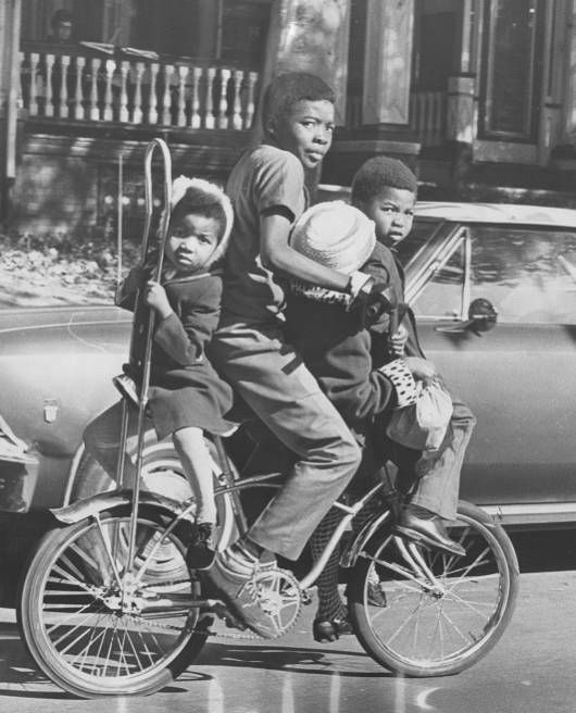 Image 9. "Mass transit means four on a bike for youngsters making a trip along 54th st. near Chester av. in West Philadelphia." (Pasquarella, Don. “Mass transit” November 1, 1969. George D. McDowell Philadelphia Evening Bulletin Collection.)