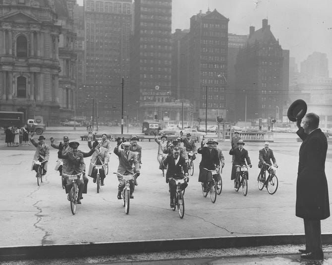 Image 7. "Mayor Dilworth (right) welcomes young business and professional men arriving at Reyburn Plaza after bicycling along the Benjamin Franklin Parkway from the Philadelphia Museum of Art. Demonstration was sponsored by the Heart Association of Southeastern Pennsylvania to show that cycling is good for health." (“Bicycle journey for health ends at Reyburn Plaza” February 7, 1957. George D. McDowell Philadelphia Evening Bulletin Collection.)