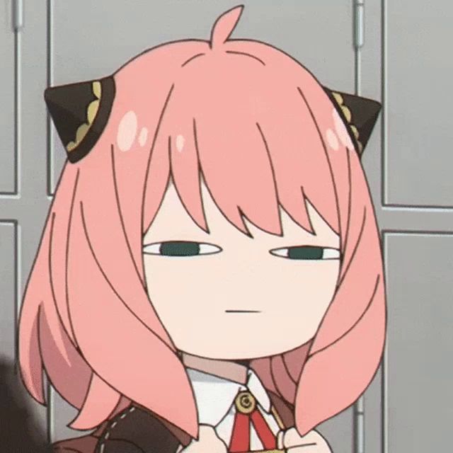 a cartoon character with pink hair and cat ears making a funny face