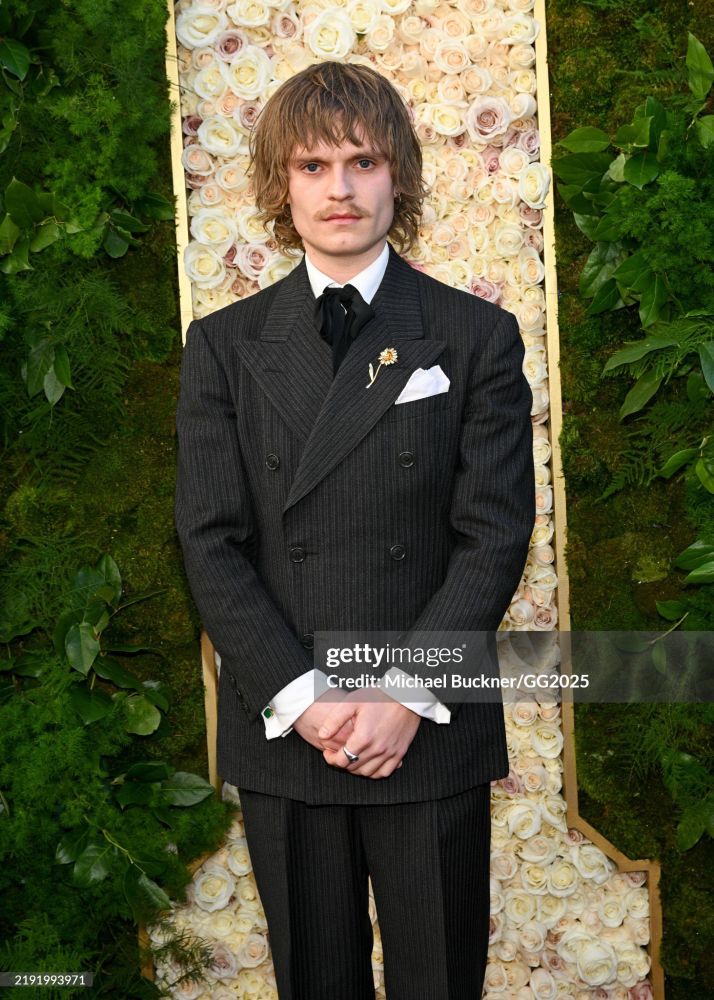 Tom Glynn-Carney at the golden globes red carpet. 