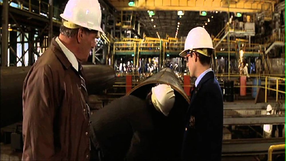 Max Fischer pitching the aquarium to Bluth in his factory