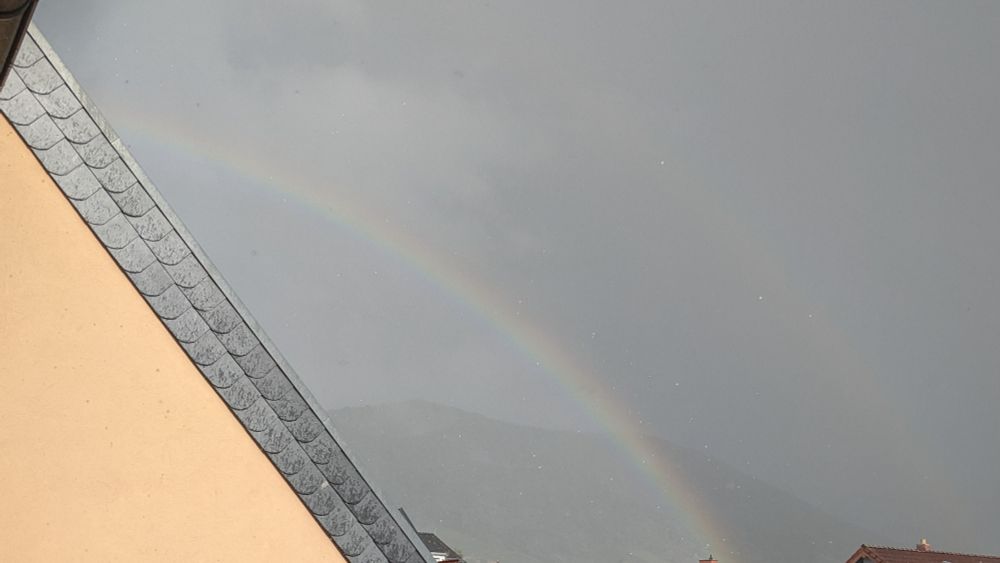 Double Rainbow over a grey sky 
