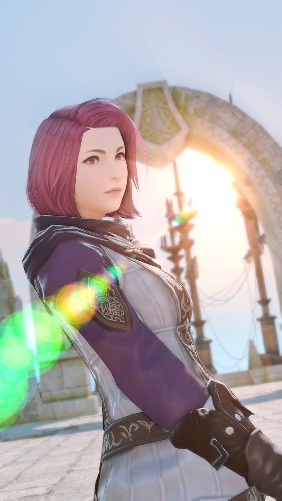 A close-up shot of a character with short pink hair and light-colored eyes. They are wearing a white and purple tunic with fingerless gloves and a dark purple scarf. The background is a bright, sun-drenched stone archway.